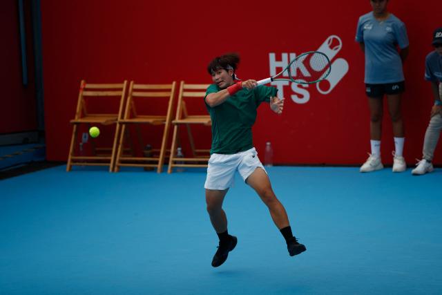 Peangtarn Plipuech of Thailand hits a return against Jiang Xinyu and Wang Yafan of China during the women's doubles final match in the Hong Kong Tennis Open in Hong Kong on November 2, 2025. (Photo by May James / AFP)