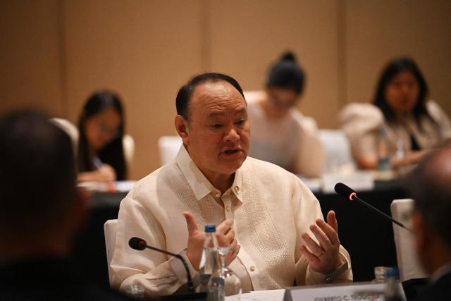 Philippines' Secretary of National Defence Gilberto Teodoro speaks during the bilateral meeting with Canadian Minister of Defence David McGuinty (not pictured) in Manila on November 2, 2025.  (Photo by Ted ALJIBE / AFP)