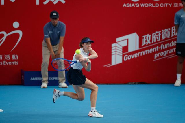 Spain's Cristina Bucsa hits a return to Victoria Mboko of Canada during the women's singles final of the Hong Kong Tennis Open in Hong Kong on November 2, 2025. (Photo by May James / AFP)