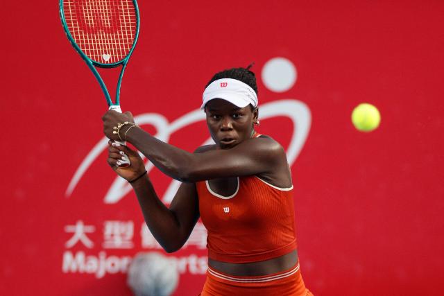 Victoria Mboko of Canada hits a return to Spain's Cristina Bucsa during the women's singles final of the Hong Kong Tennis Open in Hong Kong on November 2, 2025. (Photo by May James / AFP)