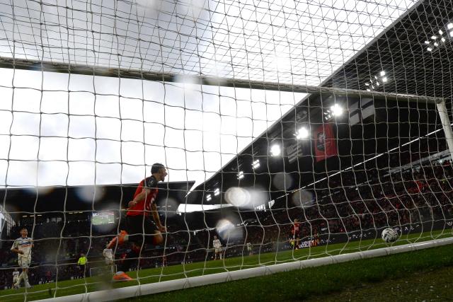 Rennes' French forward #09 Esteban Lepaul (L) celebrates scoring his team's fourth goal during the French L1 football match between Stade Rennais FC and RC Strasbourg Alsace at the Roazhon Park stadium in Rennes, western France, on November 2, 2025. (Photo by JEAN-FRANCOIS MONIER / AFP)