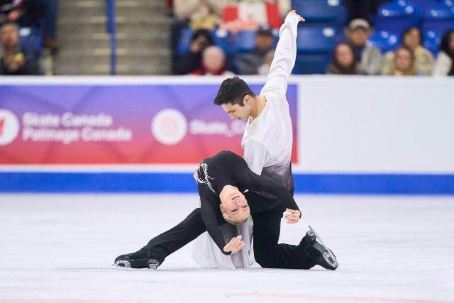 Marjorie Lajoie and Zachary Lagha of Canada skate their routine in the Ice Dance competition during the ISU Grand Prix of Figure Skating 2025 Skate Canada International at the SaskTel Centre in Saskatoon, Saskatchewan, Canada on November 2, 2025. (Photo by Geoff Robins / AFP)