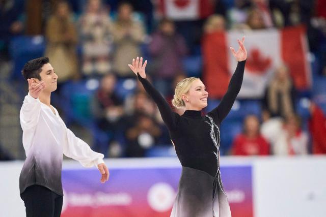 Marjorie Lajoie and Zachary Lagha of Canada skate their routine in the Ice Dance competition during the ISU Grand Prix of Figure Skating 2025 Skate Canada International at the SaskTel Centre in Saskatoon, Saskatchewan, Canada on November 2, 2025. (Photo by Geoff Robins / AFP)