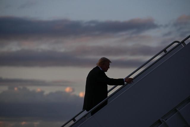 US President Donald Trump boards Air Force One at Palm Beach International Airport in West Palm Beach, Florida, on November 2, 2025. Trump is returning to the White House from his Mar-a-Lago, Florida, residence where he spent the weekend. (Photo by ROBERTO SCHMIDT / AFP)