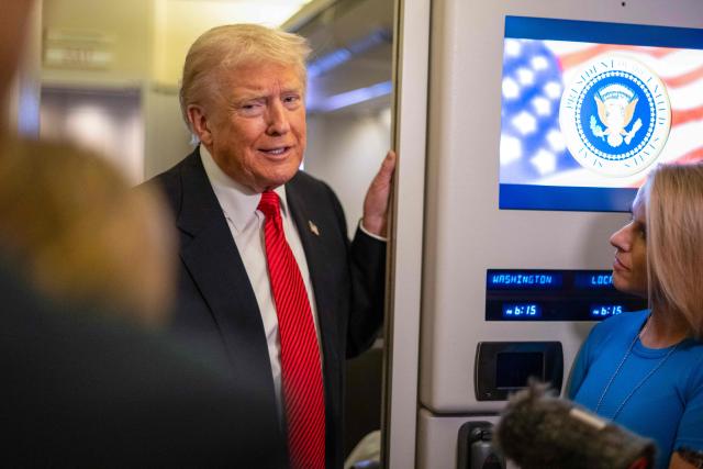 US President Donald Trump speaks to members of the press aboard Air Force One as he heads to Joint Base Andrews in Maryland after departing West Palm Beach, Florida on November 2, 2025. Trump is returning to the White House from his Mar-a-Lago, Florida, residence where he spent the weekend. (Photo by ROBERTO SCHMIDT / AFP)