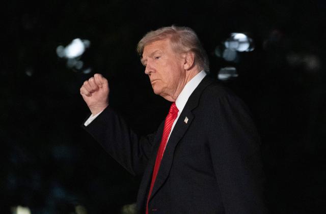 US President Donald Trump gestures as he walks on the South Lawn upon arrival at the White House in Washington, DC, on November 2, 2025. Trump is returning to the White House from his Mar-a-Lago, Florida, residence where he spent the weekend. (Photo by Allison ROBBERT / AFP)