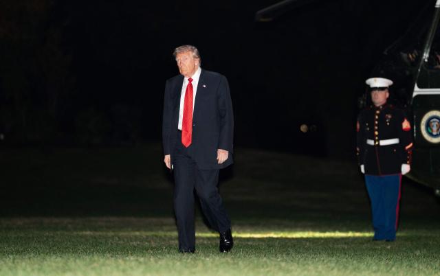 US President Donald Trump walks on the South Lawn upon arrival at the White House in Washington, DC, on November 2, 2025. Trump is returning to the White House from his Mar-a-Lago, Florida, residence where he spent the weekend. (Photo by Allison ROBBERT / AFP)