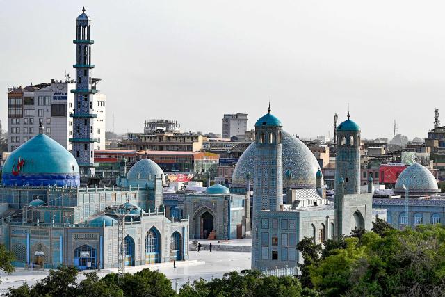 (FILES) A general view shows the Hazrat-e-Ali shrine or the Blue Mosque in Mazar-i-Sharif on June 21, 2025. The Blue Mosque of Mazar-i-Sharif, a 15th-century landmark famed for its vibrant tiles, was damaged by a magnitude 6.3 earthquake that struck northern Afghanistan overnight, an AFP journalist saw on November 3, 2025. (Photo by Wakil KOHSAR / AFP)