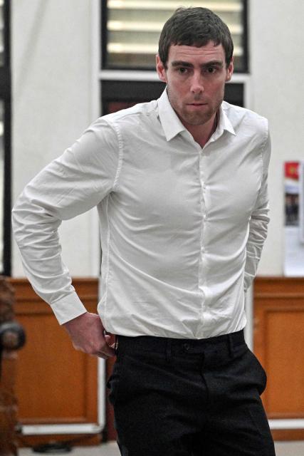 Australian suspect Darcy Francesco Jenson attends his trial at a courtroom in Denpasar on Indonesia's resort island of Bali on November 3, 2025. The trial of three Australians accused of plotting the murder of a compatriot at a villa in Bali began on October 30, 2025, with all facing the death penalty. (Photo by SONNY TUMBELAKA / AFP)