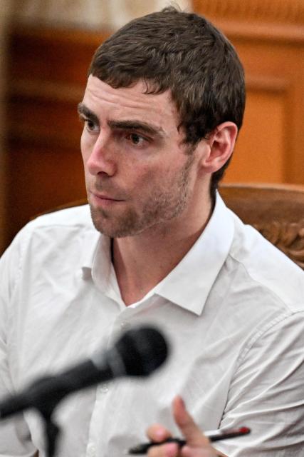 Australian suspect Darcy Francesco Jenson attends his trial at a courtroom in Denpasar on Indonesia's resort island of Bali on November 3, 2025. The trial of three Australians accused of plotting the murder of a compatriot at a villa in Bali began on October 30, 2025, with all facing the death penalty. (Photo by SONNY TUMBELAKA / AFP)