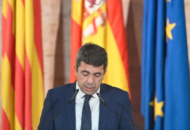 President of Valencia's Region Carlos Mazon gives a press conference at Valencia's Palau de la Generalitat on November 3, 2025. The leader of Spain's flood-hit Valencia region has faced fierce scrutiny over his handling of the October 29, 2024 catastrophe that killed more than 230 people, consistently rebuffing calls for his resignation. (Photo by Jose JORDAN / AFP)