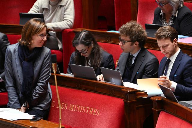 France's Minister in charge of Public Accounts Amelie de Montchalin (L) attends a parliamentary debate focused on the 2026 budget at The National Assembly, France's lower house parliament, in Paris on November 3, 2025. (Photo by Bertrand GUAY / AFP)
