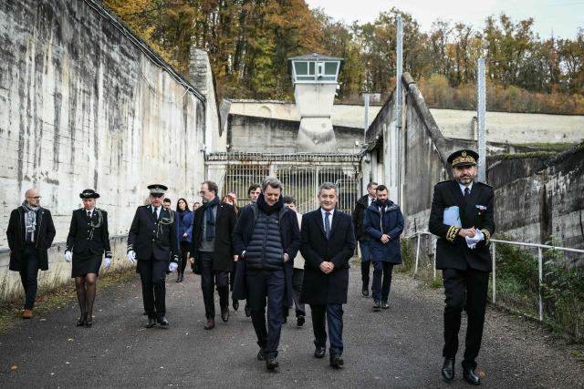 France's Minister of Justice Gerald Darmanin (C-R) visits the historical site of the former Clairvaux penitentiary in Ville-sous-la-Ferte, northeastern France on November 3, 2025. (Photo by ARNAUD FINISTRE / AFP)
