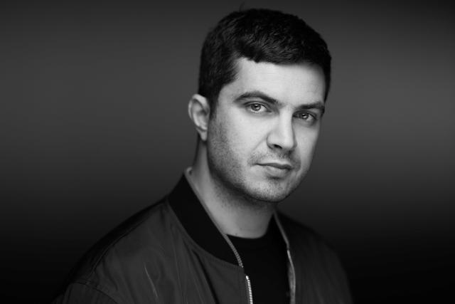 French author and director Jeremie Guez poses during a photo session in Paris, on November 3, 2025. (Photo by JOEL SAGET / AFP)