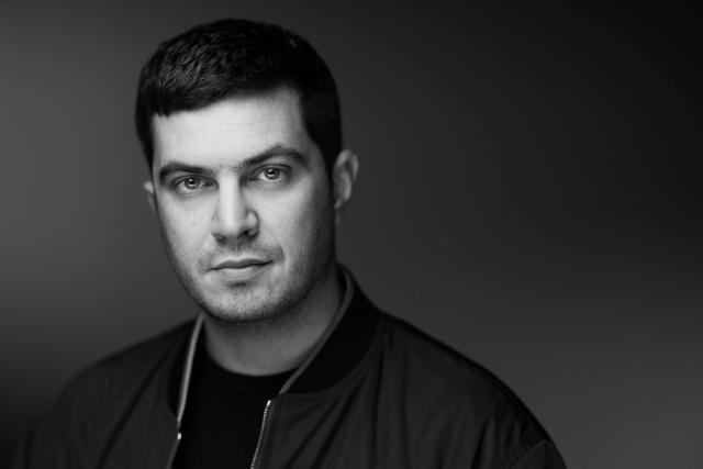 French author and director Jeremie Guez poses during a photo session in Paris, on November 3, 2025. (Photo by JOEL SAGET / AFP)