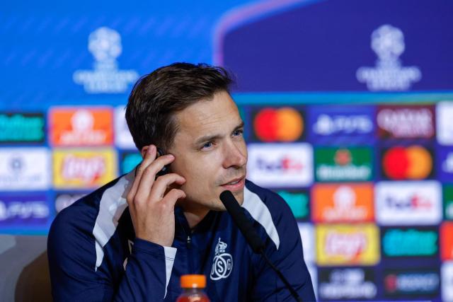 Union St-Gilloise's Belgian head coach David Hubert listens during a press conference on the eve of the UEFA Champions League league phase day 4 football match between Club Atletico de Madrid and Union St-Gilloise at the Metropolitano Stadium in Madrid on November 3, 2025. (Photo by Oscar DEL POZO / AFP)