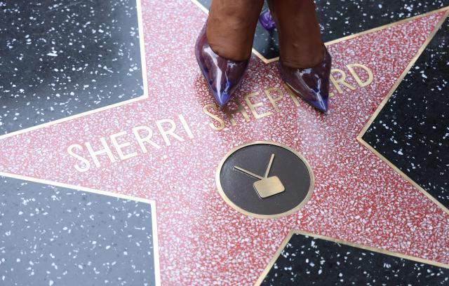 US actress Sherri Shepherd stands on her newly unveiled star at the Hollywood Walk of Fame in Los Angeles on November 3, 2025. (Photo by Michael Tran / AFP)