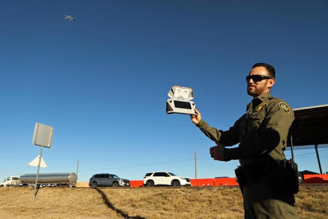 A US Border Patrol agent from the Big Bend Sector demonstrates the use of a drone to detect undocumented migrants near the Marfa checkpoint in Texas, United States, on November 3, 2025. (Photo by HERIKA MARTINEZ / AFP)