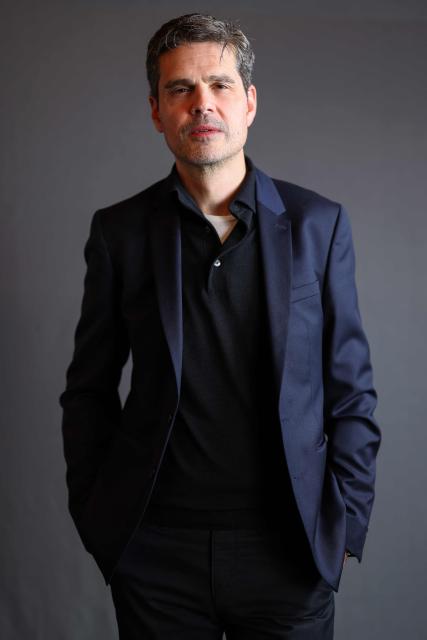 French director Yann Gozlan poses during The American French Film Festival (TAFFF) at the Directors Guild of America (DGA) Theater in Los Angeles on November 3, 2025. The 29th edition of The American French Film Festival takes place at the Directors Guild of America (DGA) from October 28 to November 3. (Photo by VALERIE MACON / AFP)