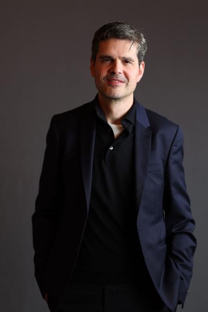 French director Yann Gozlan poses during The American French Film Festival (TAFFF) at the Directors Guild of America (DGA) Theater in Los Angeles on November 3, 2025. The 29th edition of The American French Film Festival takes place at the Directors Guild of America (DGA) from October 28 to November 3. (Photo by VALERIE MACON / AFP)