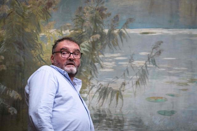 (FILES) French former anaesthetist Frederic Pechier reacts during a break on the opening day of his trial, at Besancon's courthouse, in Besancon, north eastern France, on September 8, 2025. Two cases dated from January-March 2015 will be studied by a court in Besancon from November 6, 2025 during the trial of the former anaesthetist. (Photo by SEBASTIEN BOZON / AFP)