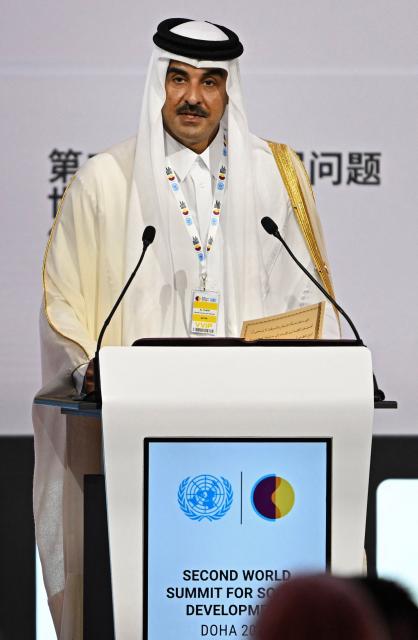 Qatar’s Emir Sheikh Tamim bin Hamad Al-Thani speaks during the United Nations' Second World Summit for Social Development in Doha on November 4, 2025. (Photo by Mahmud HAMS / AFP)