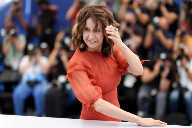 (FILES) French actress and director Valerie Lemercier poses during a photocall for the film "Aline, The Voice OF Love" at the 74th edition of the Cannes Film Festival in Cannes, southern France, on July 14, 2021. Valérie Lemercier returns to the stage after a ten-year absence with her new show "La classe et la grosse connerie. Les deux !" (Class and utter nonsense. Both!), in which she revives the offbeat and sometimes trashy humour that brought her to prominence in the late 1980s. (Photo by Valery HACHE / AFP)