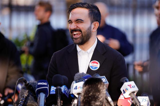 Democratic New York City mayoral candidate Zohran Mamdani speaks to the press after voting at a polling location at Frank Sinatra School of Arts in the Queens borough of New York City on November 4, 2025. New Yorkers will pick a new mayor on November 4 after an unpredictable race that has drawn attention from far beyond the largest city in the United States, with President Donald Trump branding frontrunner Zohran Mamdani "a communist." Breakout Democratic Party candidate Mamdani, a naturalized Muslim American who represents Queens in the state legislature, leads former governor and sex assault-accused Andrew Cuomo, running as an independent after losing his party's primary contest to Mamdani. (Photo by Leonardo Munoz / AFP)