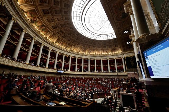 Members of Parliament attend a session of questions to the government at the National Assembly, French Parliament's lower house, in Paris on November 4, 2025. (Photo by STEPHANE DE SAKUTIN / AFP)