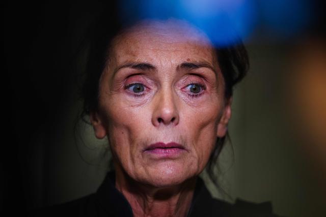Former Director General of Lafarge Bruno Lafont's lawyer Jacqueline Laffont addresses media during the opening day of the trial of the French cement group Lafarge and eight individuals, including former executives, accused of financing terrorism in Syria, at the Paris courthouse, in Paris, on November 4, 2025. Cement group Lafarge goes on trial in France on November 4, 2025, accused of paying the Islamic State group and other jihadists protection money to build its business in war-torn Syria. (Photo by Dimitar DILKOFF / AFP)