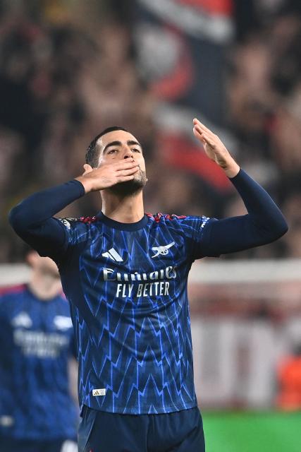 Arsenal's Spanish midfielder #23 Mikel Merino celebrates after the UEFA Champions League - league phase day 4 football match between Slavia Prague and Arsenal FC in Prague, Czech Republic on November 4, 2025. (Photo by Michal Cizek / AFP)