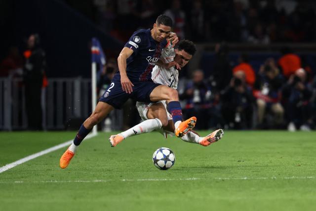 Bayern Munich's Colombian forward #14 Luis Diaz (R) tackles Paris Saint-Germain's Moroccan defender #02 Achraf Hakimi during the UEFA Champions League, league phase day 4, football match between Paris Saint-Germain (PSG) and FC Bayern Munich at the Parc des Princes in Paris, on November 4, 2025. (Photo by Anne-Christine POUJOULAT / AFP)