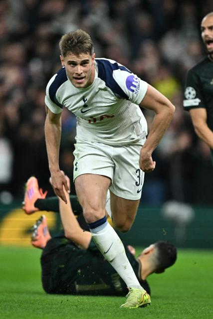 Tottenham Hotspur's Dutch defender #37 Micky van de Ven celebrates after scoring their third goal during the UEFA Champions League, league phase football match between Tottenham Hotspur and FC Copenhagen at the Tottenham Hotspur Stadium in London, on November 4, 2025. (Photo by Ben STANSALL / AFP)