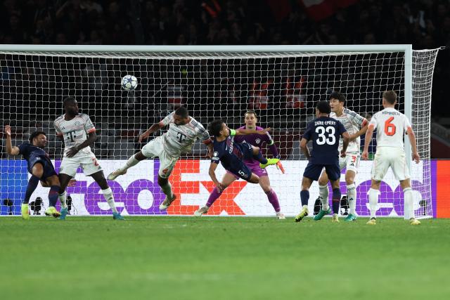 Paris Saint-Germain's Brazilian defender #05 Marquinhos (C-R) fights for the ball with Bayern Munich's German defender #04 Jonathan Tah (C-L) during the UEFA Champions League, league phase day 4, football match between Paris Saint-Germain (PSG) and FC Bayern Munich at the Parc des Princes in Paris, on November 4, 2025. (Photo by Thomas SAMSON / AFP)