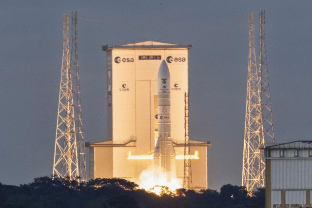 This photograph shows the European Space Agency (ESA) Ariane 6 rocket carrying the Sentinel 1-D earth observation satellite by European Space Agency (ESA) blasts off at the Guiana Space Centre in Kourou, on the French overseas department of Guiana, on November 4, 2025. (Photo by Ronan LIETAR / AFP)