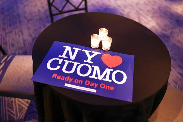 A sign is seen on a table ahead of New York City mayoral candidate Andrew Cuomo's election night event at the Ziegfeld Ballroom in Midtown Manhattan on November 4, 2025. (Photo by CHARLY TRIBALLEAU / AFP)