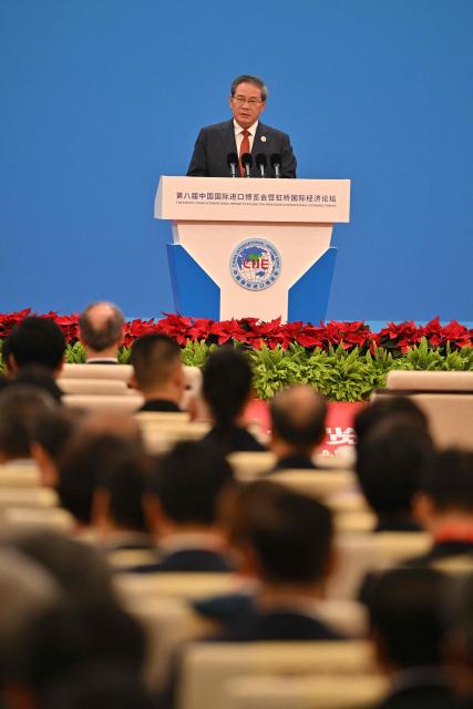 China's Premier Li Qiang speaks during the opening ceremony of the 8th China International Import Expo (CIIE) and the Hongqiao International Economic Forum in Shanghai on November 5, 2025. (Photo by Hector RETAMAL / AFP)