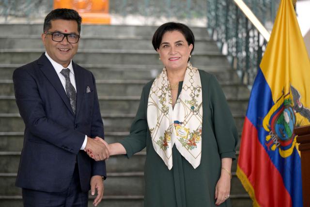 India's Minister of State for External Affairs Pabitra Margherita (L) and Ecuador's Foreign Minister Gabriela Sommerfeld (R) shake hands after a joint press conference at the Najas Palace in Quito on November 5, 2025. (Photo by Rodrigo BUENDIA / AFP)