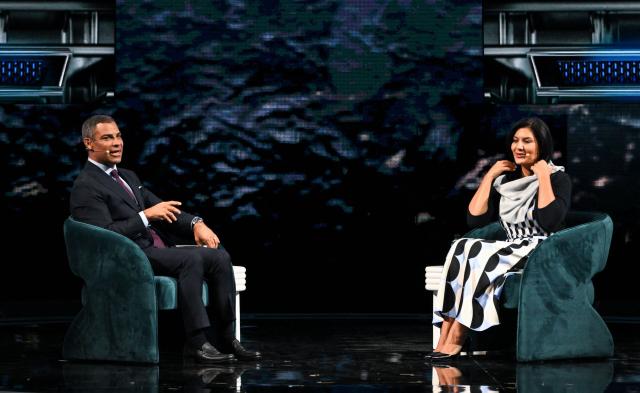 (L/R) Miami Mayor Francis Suarez speaks with Saudi Arabia's Ambassador to the US Reema bint Bandar Al Saud during the American Business Forum at the Kaseya Center in Miami on November 5, 2025. (Photo by Chandan Khanna / AFP)