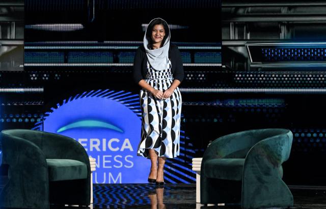 Saudi Arabia's Ambassador to the US Reema bint Bandar Al Saud steps on stage at the American Business Forum at the Kaseya Center in Miami on November 5, 2025. (Photo by Chandan Khanna / AFP)