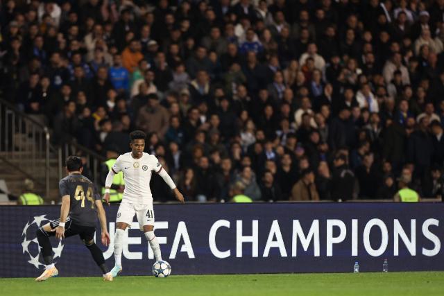 Qarabag's Azerbaijan defender #44 Elvin Dzhafarquliyev and Chelsea's Brazilian midfielder #41 Estevao vie for the ball during the UEFA Champions League league phase football match between Qarabag and Chelsea at the Tofiq Bahramov Republican Stadium in Baku on November 5, 2025. (Photo by Giorgi ARJEVANIDZE / AFP)