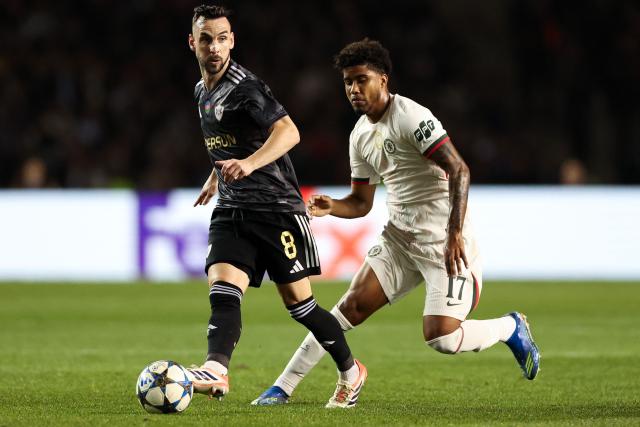 Qarabag's Montenegrin midfielder #08 Marko Jankovic and Chelsea's Brazilian midfielder #17 Andrey Santos vie for the ball during the UEFA Champions League league phase football match between Qarabag and Chelsea at the Tofiq Bahramov Republican Stadium in Baku on November 5, 2025. (Photo by Giorgi ARJEVANIDZE / AFP)