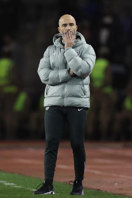 Chelsea's Italian head coach Enzo Maresca reacts during the UEFA Champions League league phase football match between Qarabag and Chelsea at the Tofiq Bahramov Republican Stadium in Baku on November 5, 2025. (Photo by Giorgi ARJEVANIDZE / AFP)