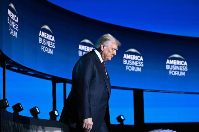 US President Donald Trump arrives to speak at the American Business Forum at the Kaseya Center in Miami on November 5, 2025. (Photo by Brendan SMIALOWSKI / AFP)