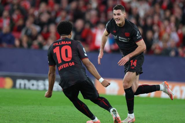 Bayer Leverkusen's Czech forward #14 Patrik Schick celebrates scoring the opening goal during the UEFA Champions League league phase day 4 football match between SL Benfica and Bayer Leverkusen at Estadio da Luz in Lisbon on November 5, 2025. (Photo by PATRICIA DE MELO MOREIRA / AFP)
