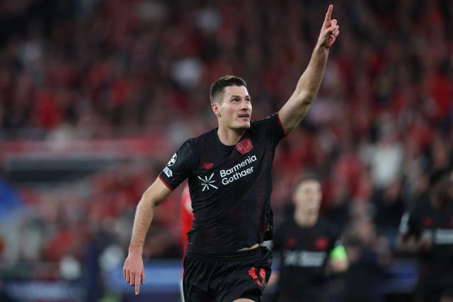 Bayer Leverkusen's Czech forward #14 Patrik Schick celebrates scoring the opening goal during the UEFA Champions League league phase day 4 football match between SL Benfica and Bayer Leverkusen at Estadio da Luz in Lisbon on November 5, 2025. (Photo by PATRICIA DE MELO MOREIRA / AFP)