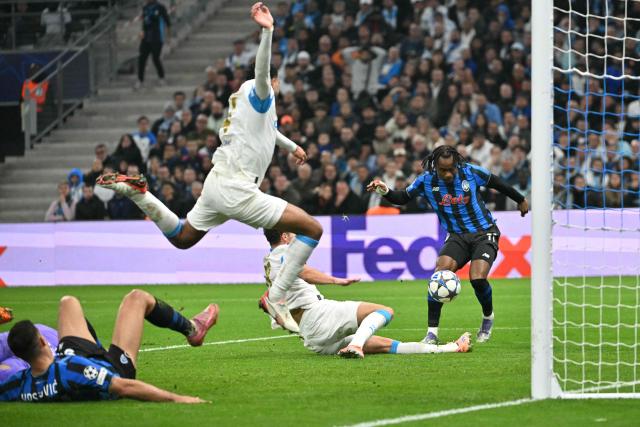 Atalanta's Nigerian forward #11 Ademola Lookman scores a goal which was later disallowed after a VAR review during the UEFA Champions League, league phase day 4, football match between Olympique de Marseille (OM) and Atalanta Bergame at the Velodrome stadium, in Marseille on November 5, 2025. (Photo by Christophe Simon / AFP)