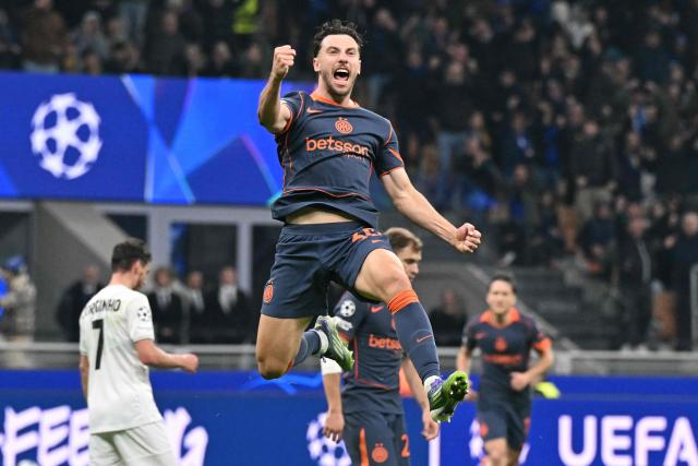 Inter Milan's Brazilian defender #30 Carlos Augusto celebrates scoring his team's second goal during the UEFA Champions League phase day 4 football match between Inter Milan and Kairat Almaty at San Siro stadium in Milan, on November 5, 2025. (Photo by Stefano RELLANDINI / AFP)