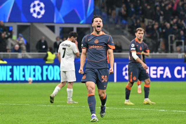Inter Milan's Brazilian defender #30 Carlos Augusto celebrates scoring his team's second goal during the UEFA Champions League phase day 4 football match between Inter Milan and Kairat Almaty at San Siro stadium in Milan, on November 5, 2025. (Photo by Stefano RELLANDINI / AFP)