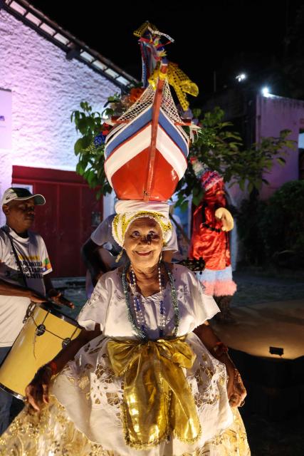 A woman performs during the opening of the Festival "Our Future – Brazil-France, dialogues with Africa" in Salvador, Bahia State, Brazil on November 5, 2025. (Photo by Ludovic MARIN / AFP)